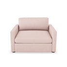 Lucie Fåtölj Blush. Lucie är en stilren lounge-fåtölj i rosa linne som tillhör vårt modulära soffsystem med samma namn.