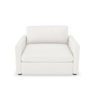 Lucie Fåtölj True White. Lucie är en stilren lounge-fåtölj i vit linne som tillhör vårt modulära soffsystem med samma namn.