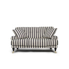Blanca Love Seat Randig är en liten Howard-soffa i linne med svarta ränder från Melimeli