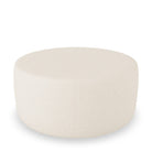 Blanca Fotpall Eggshell 70 cm. Rund fotpall i äggskalsvit bouclé som passar ihop med alla våra soffor. Blanca är en mångsidig sittpuff och kan därför användas som pall, fotstöd, prydnad eller varför inte som bord att ställa din frukostbricka på?