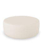 Blanca Fotpall Eggshell 90 cm. Rund fotpall i äggskalsvit bouclé som passar ihop med alla våra soffor. Blanca är en mångsidig sittpuff och kan därför användas som pall, fotstöd, prydnad eller varför inte som bord att ställa din frukostbricka på?