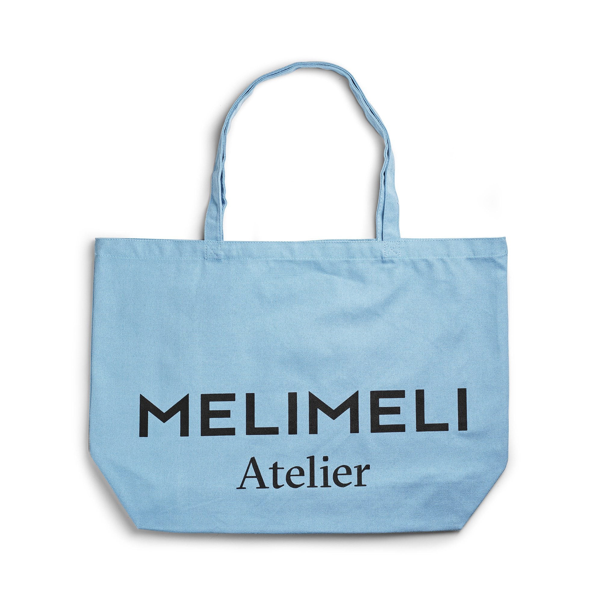 Tote bag i ljus blå färg med Melimeli logga
